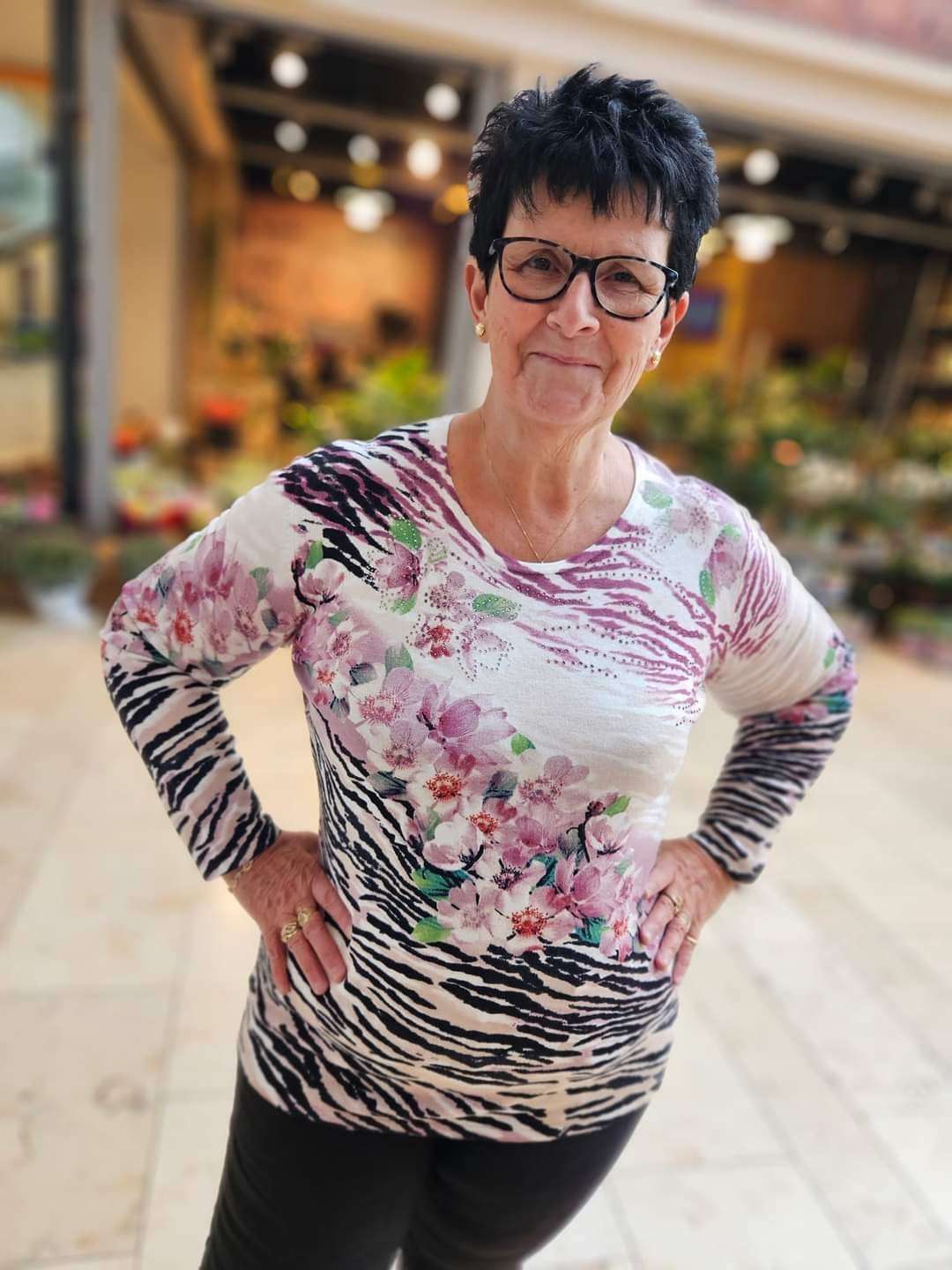 Trui roze bloem panter mix